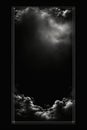 a black and white photo of clouds and a dark sky