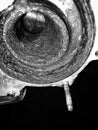 Black and white photo of the corroded cooling system water pump mounting on the car engine block Royalty Free Stock Photo