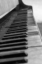 Black and white photo of destroyed old piano
