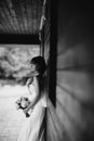 Black and white photo. elegant bride in white dress posing. Bride portrait wedding Royalty Free Stock Photo