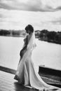 Black and white photo. elegant bride in white dress posing. Bride portrait wedding Royalty Free Stock Photo