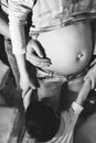 Black and white photo of family of father, pregnant mother and son Royalty Free Stock Photo