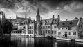 Black and White Photo of the Historic buildings and the tower of the Huidenvettershuis at the Dijver Canal in Bruges, Belgium Royalty Free Stock Photo