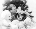 Black and white photo of kissing lovers with white vignette Royalty Free Stock Photo