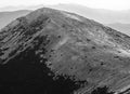 Black and white photo of a lonely mountain