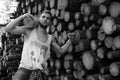 Black and white photo of a man at the factory processing wood, s Royalty Free Stock Photo