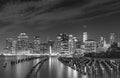 Black and white photo of Manhattan waterfront at night, NYC, USA Royalty Free Stock Photo