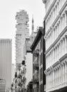 Black and white photo of modern and old buildings with fire escapes, New York, USA Royalty Free Stock Photo