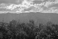 Black and white photo. Mystical view of the mountains and clouds.