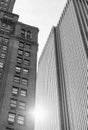 Black and white photo of New York City old and modern buildings with sun reflection, USA Royalty Free Stock Photo