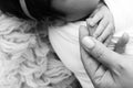 Black and white Photo of Newborn baby after birth tightly holding parents finger Royalty Free Stock Photo