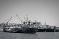 Old, decommissioned cargo boats side by side Royalty Free Stock Photo