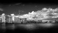 Black and White photo of the Palace of Justice viewed along the Harbor named Het IJ in Amsterdam