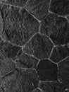 black and white photo of the pattern and texture of natural stone attached to the outer wall of the fort Royalty Free Stock Photo