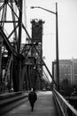 Black and white photo of Pedestrian on the Hawthorne Bridge in Portland, Oregon Royalty Free Stock Photo