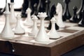 Black and white photo with a picture of a chess Board and chess pieces, Wooden chess pieces on a chess Board Royalty Free Stock Photo