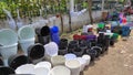 black and white photo of plant pots and various thing