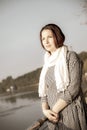 Black and white photo.Portrait of a middle-aged woman on the background of nature