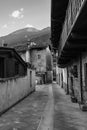 Black and white Photo of a Road without People with Rock Dwellings in Morgex in Aosta Valley, Italy