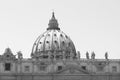 Black and white photo of Saint Peter`s Basilica in St. Peter`s Square, Vatican City. Vatican Museum, Rome