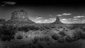 Black and White Photo of The sandstone formations of Merrick Butte and East Mitten Butte in the desert of Monument Valley Royalty Free Stock Photo