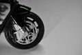 black and white photo shadow from a motorcycle wheel is a childhood dream. selective focus.