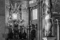 Black and white photo showing beautiful holy spirit altar and curved canopy pillar inside Saint Peter Basilica