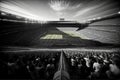 A Black And White Photo Of A Stadium. Generative AI