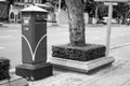 Black and White photo; Thailand post box beside the road. In Thai language means Bangkok, Other Places.