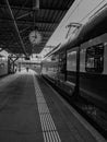 Black and White photo of train and people Royalty Free Stock Photo