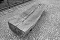 Black and white photo. Wooden bench in the park. Royalty Free Stock Photo