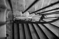 Black-white photo of wooden spiral staircase in old building, Paris, France Royalty Free Stock Photo