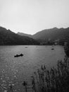 Boating on a lake with mountains in the background Royalty Free Stock Photo