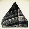 Photograph Of A Streaked Triangular Rock In The Style Of Arthur Boyd Royalty Free Stock Photo