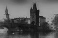 Black-and-white photograph of the Charles bridge. Prague`s historical center