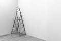 Black-and-white photograph of a ladder to repair a stained white paint standing in the corner of a freshly painted.