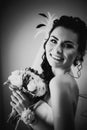 Black white photography beautiful young happy bride standing near the window Royalty Free Stock Photo