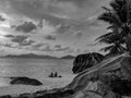 Black and White Photography of a Couple enjoying the sunset on the amazing tropical beach Anse Source d`Argent with granite