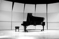 Black and White Piano on Concert Stage for Performance Royalty Free Stock Photo