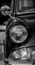 Black and white picture of front view classic car with headlight Royalty Free Stock Photo