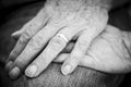 A black and white picture with a man and woman hands Royalty Free Stock Photo