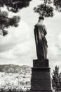 Black and white picture of the statue of Cardinal Gerlier overlooking the port of Cannes