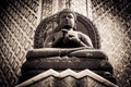 The Stone Buddha statue at the Wat Phra Kaew Palace, also known as the Emerald Buddha Temple. Bangkok, Thailand. Royalty Free Stock Photo