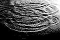 Black and white picture of water waves in the river, sea or ocean in the dark Royalty Free Stock Photo