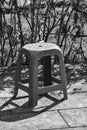 black and white from plastic chairs in front of the shop Royalty Free Stock Photo