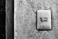Black and white plastic light switch box Royalty Free Stock Photo