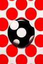 Black and white polka dot button on white background. Generative AI Royalty Free Stock Photo