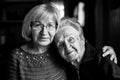 Black and white portrait of an adult woman with his elderly mother.