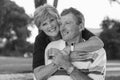 Black and white portrait of American senior beautiful and happy mature couple around 70 years old showing love and affection smili Royalty Free Stock Photo