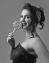 Black and white portrait of beautiful woman with Lollipop . Royalty Free Stock Photo